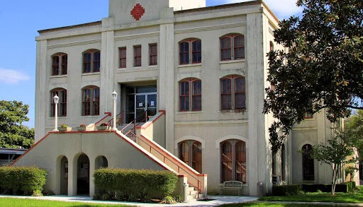 Historic multi-story courthouse building with front steps